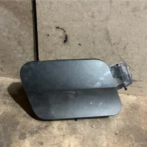 TAPA EXTERIOR COMBUSTIBLE